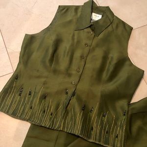 Two piece blouse and pants outfit.